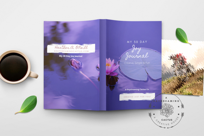 Mockup of A Daydreaming Cactus journal creation. This is the 30 Day Joy Journal with a lily pad cover with a cup of coffee.