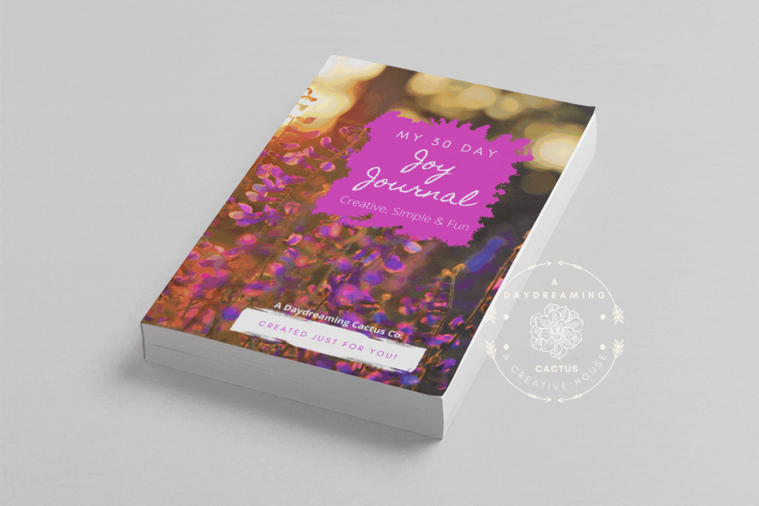 Mockup of A Daydreaming Cactus journal creation. This is the 30 Day Joy Journal with a lavender flowers cover.  